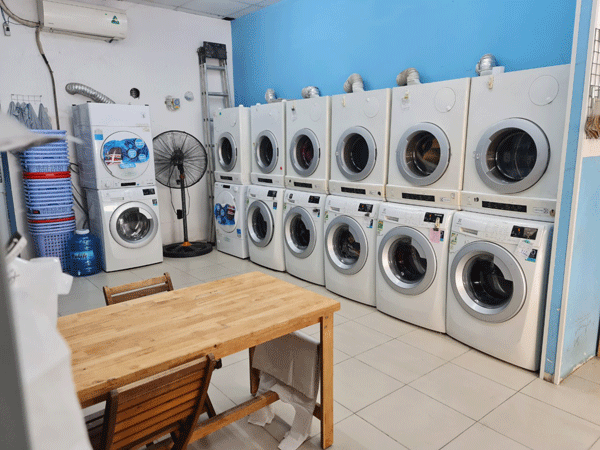 Sang tiệm giặt sấy – vệ sinh giày mặt tiền Lê Văn Lương